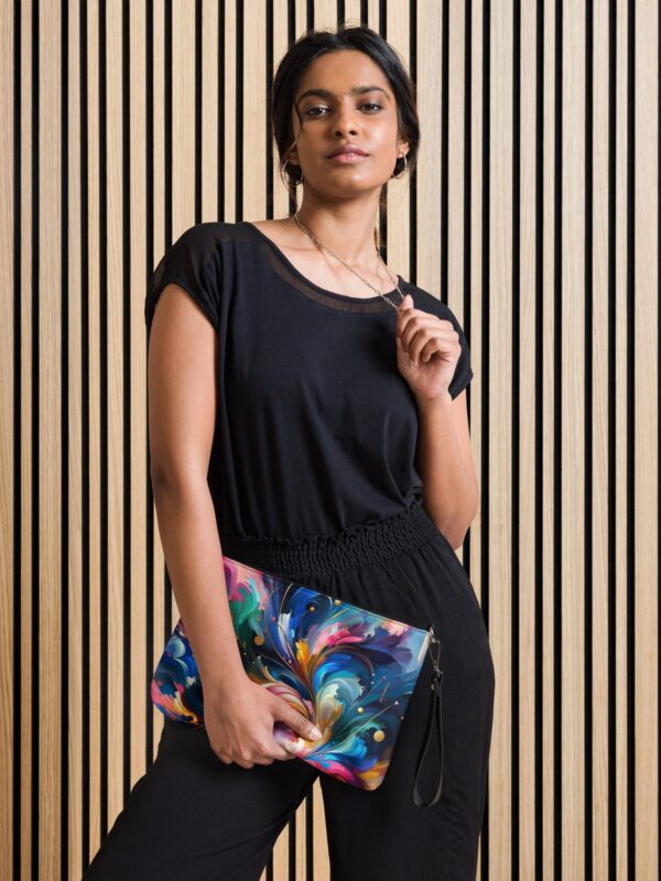 An image showcasing a stylish crossbody bag adorned with a striking multicolored pattern reminiscent of swirling galaxies and celestial bodies. This women's fashion accessory offers both flair and functionality, with ample space for essentials and an adjustable shoulder strap for comfort. Perfect for adding a pop of cosmic charm to any outfit.