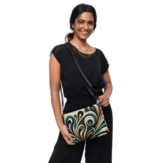 An image showcasing a sophisticated crossbody bag with a sleek and minimalist design, perfect for the modern individual on the move. The durable construction and adjustable shoulder strap offer both style and functionality, making it ideal for everyday use.