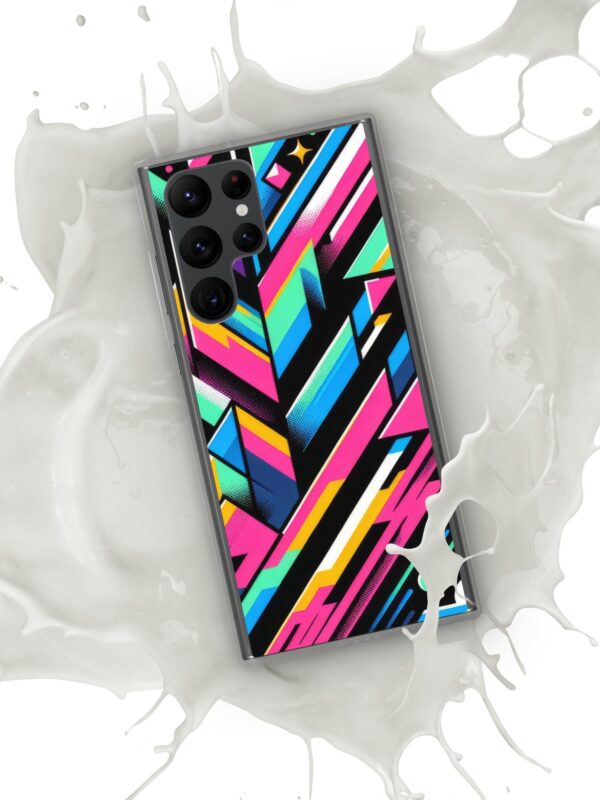 An image of a ZestFiesta Clear Case for a Samsung® smartphone, featuring a bright, abstract geometric pattern with sharp angles in pink, blue, yellow, and black on a transparent background. The case has precise cutouts for the phone's cameras and buttons, and is shown partially submerged in a white liquid, suggesting water resistance.