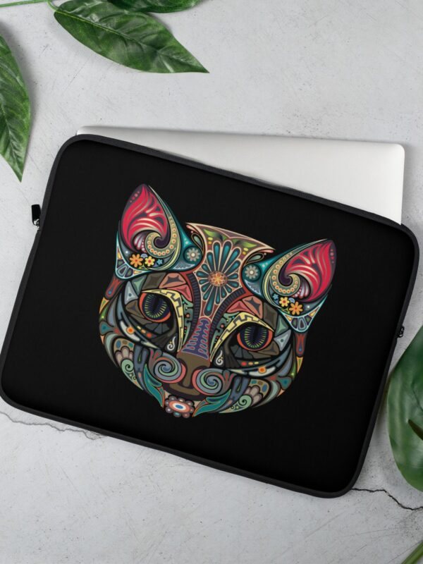 The "Boho Feline Mystique Laptop Sleeve" is a durable, stylish protector for your laptop, featuring a distinctive bohemian cat design for a touch of personality.