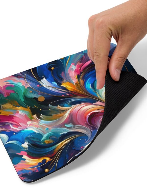 An image of a high-quality gaming mouse pad adorned with a cosmic pattern of swirling colors and nebula-like designs, creating a vibrant and engaging visual that's both aesthetically pleasing and practical for gaming precision.