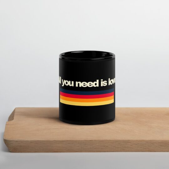 black glossy mug black 11 oz front 65e2c94fc673c - Loony Banana - https://loonybanana.com/shop/accessories/drinkware/all-you-need-is-love-mug/