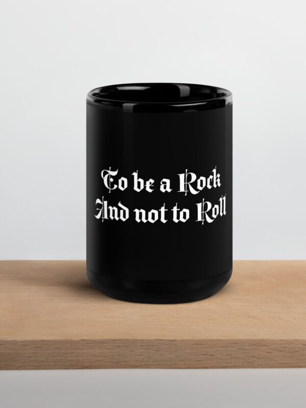 Black Mug with typography, "To be a Rock and not to Roll."